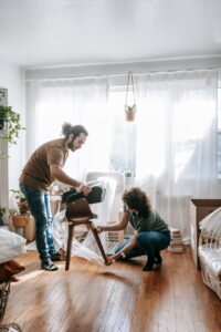 couple wrapping a chair